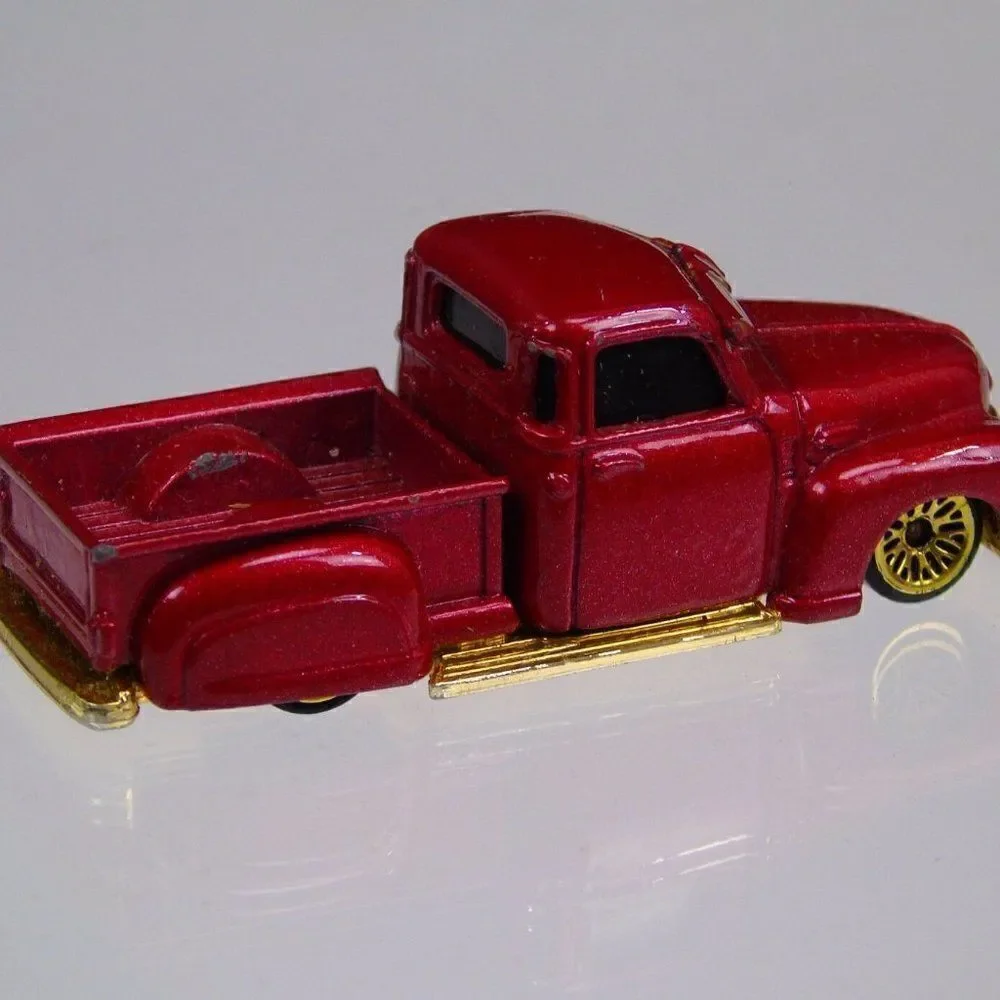 Vintage 2000 Hotwheels La Troca GM TM Red Gold Diecast Toy Car